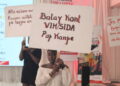 Les déterminants de la santé dans les slogans et les pancartes à la Journée mondiale du Sida en Haïti