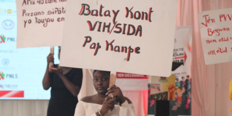 Les déterminants de la santé dans les slogans et les pancartes à la Journée mondiale du Sida en Haïti